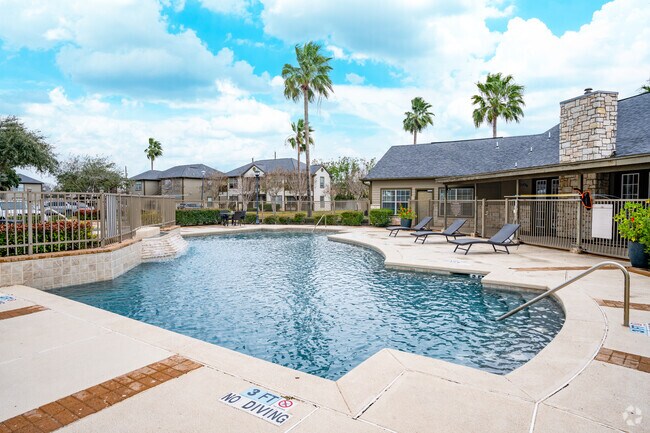 Área de piscina de los apartamentos Sundance - The Sundance Apartments