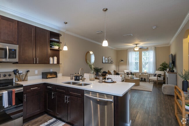 Building Photo - The Oasis at Highwoods Preserve