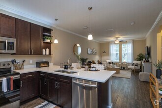 Building Photo - The Oasis at Highwoods Preserve