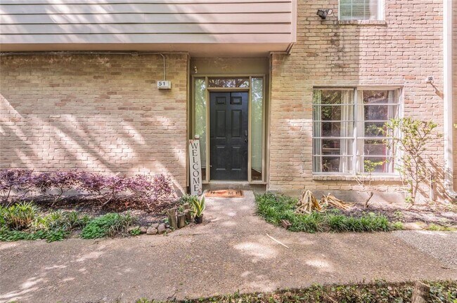 Front door with security camera - 2100 Tanglewilde St