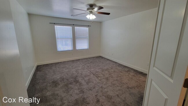 Building Photo - 4 br, 2.5 bath House - 5915 S Challenger Way