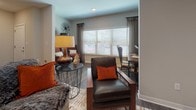 This single-floor residence in Bartlesville, Oklahoma, offers a thoughtfully designed layout with modern finishes and a cohesive aesthetic throughout. The kitchen is a standout feature, showcasing dark taupe cabinetry, granite countertops, a subway tile backsplash, and a full suite of stainless steel appliances, including a range with over-the-range microwave and a refrigerator. A peninsula with bar seating opens directly to the main living area, creating a seamless flow ideal for entertaining. The living room is generously proportioned with durable wood-look plank flooring, neutral walls, and large windows that allow ample natural light to fill the space. The primary bedroom features plush carpeting, a walk-in closet, and a private en-suite bathroom with dark cabinetry, granite countertops, a large vanity mirror, and tile flooring. A second bedroom, equally well-appointed with soft carpet and natural light, provides comfortable secondary accommodations. The bathrooms are finished with tile flooring, and at least one includes a walk-in shower. Throughout the residence, clean lines, neutral tones, and quality materials create a warm, contemporary ambiance suited to modern living.