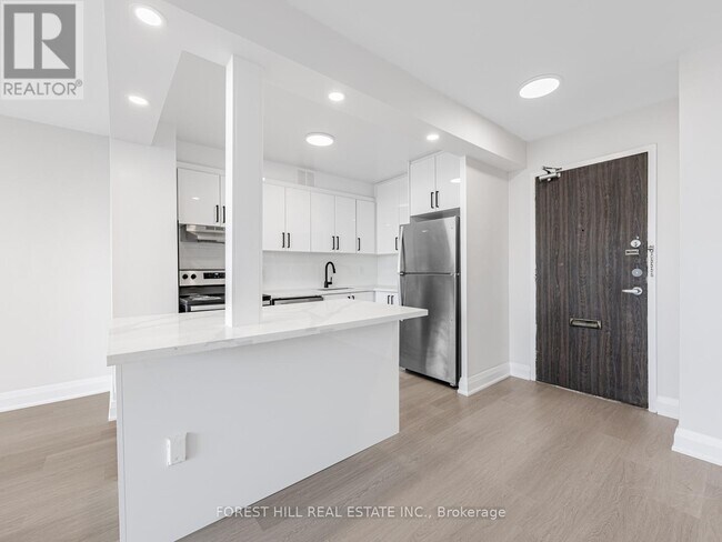 Photo du bâtiment - 140-1140 Elm Ridge Dr