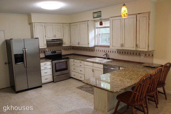Building Photo - 4 br, 2 bath House - 7 Brookridge Dr