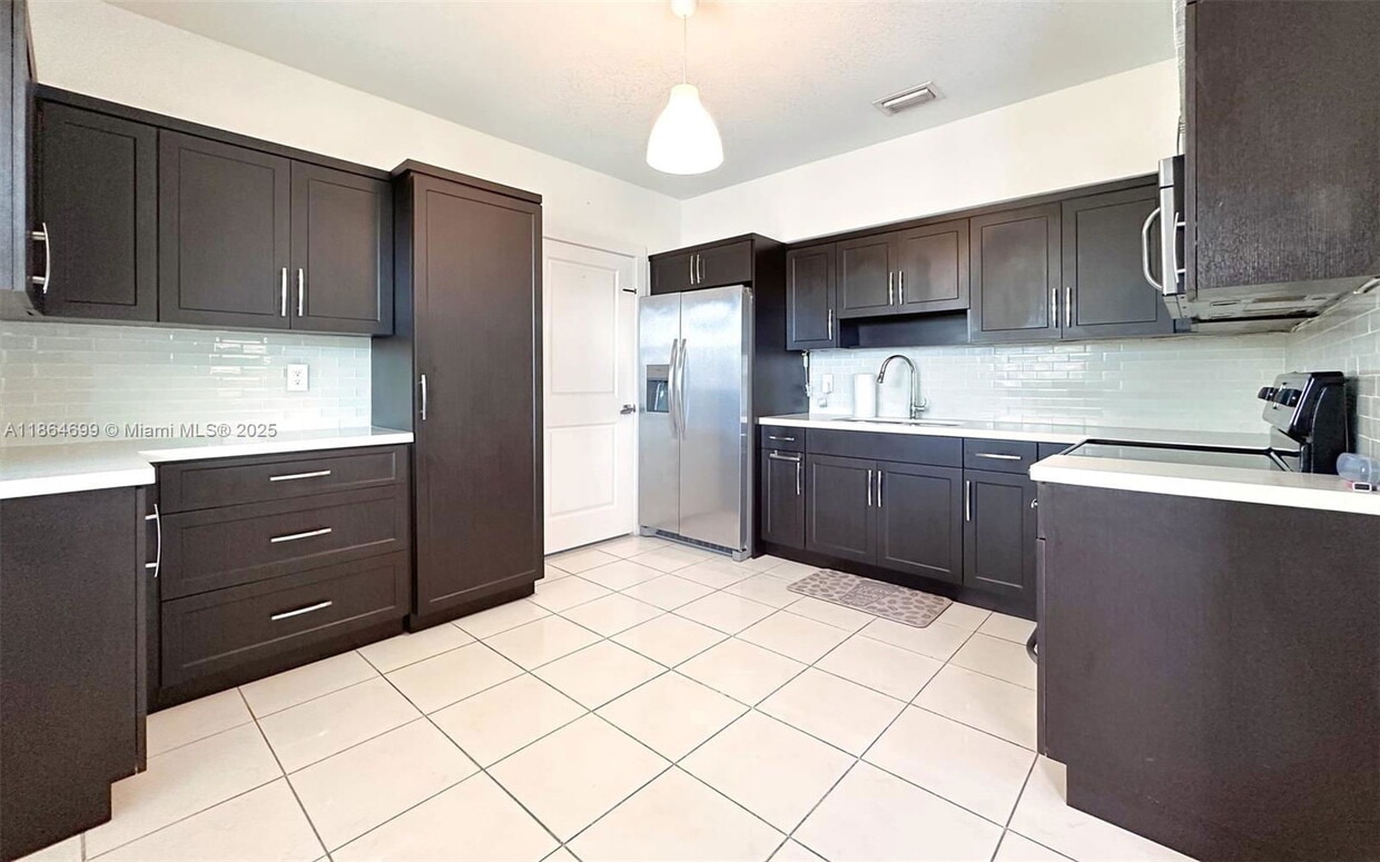 Photo - 7222 Southwest 34th Street, Miami, FL 33155 - 3 BR 2 BA single-family home