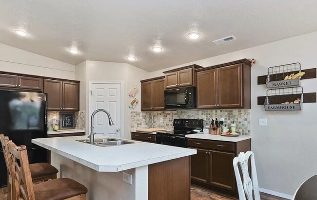 Building Photo - 12370 W Hollowtree Ct