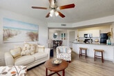 Located at 500 Malabar Road Southwest in Palm Bay, Florida, this single-story, 3-bedroom, 2-bathroom home offers a practical and comfortable layout designed for everyday living. The open-concept main living area features wood-look flooring throughout and a ceiling fan with light fixture, creating a bright and airy atmosphere. A large window brings in natural light, offering pleasant outdoor views and enhancing the welcoming ambiance of the living room.

The kitchen is a functional highlight, featuring granite countertops, white cabinetry, black appliances including a refrigerator, range, and microwave, as well as a peninsula with bar seating that connects seamlessly to both the living and dining areas. A dedicated pantry provides additional storage convenience.

The dining area is positioned adjacent to the kitchen and living room, completed with pendant lighting and easy access to the rest of the home. Two full bathrooms include a tub-shower combination with granite vanity countertops and wood-look flooring.

The three bedrooms are carpeted and each features a window with outdoor views, providing natural light and a comfortable retreat. Multiple closets throughout the home offer ample storage. A dedicated laundry room adds further practicality to this well-organized floor plan.