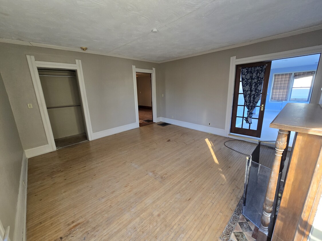 Beautiful wood floors front room, facing the street - 404 W Wisconsin Ave