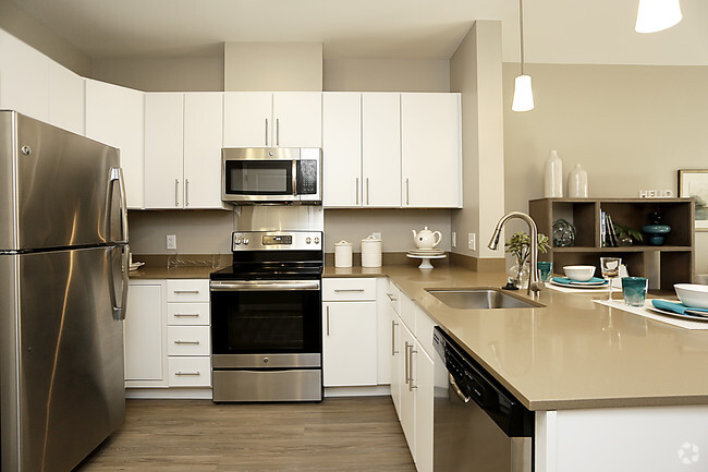 Quartz and Stainless Steel Kitchens - Riverfront Landing