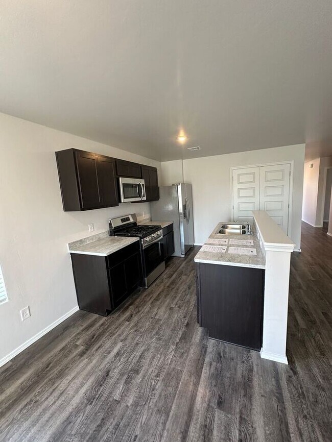 Building Photo - *Preleasing* BRAND NEW Four Bedroom | Two ...