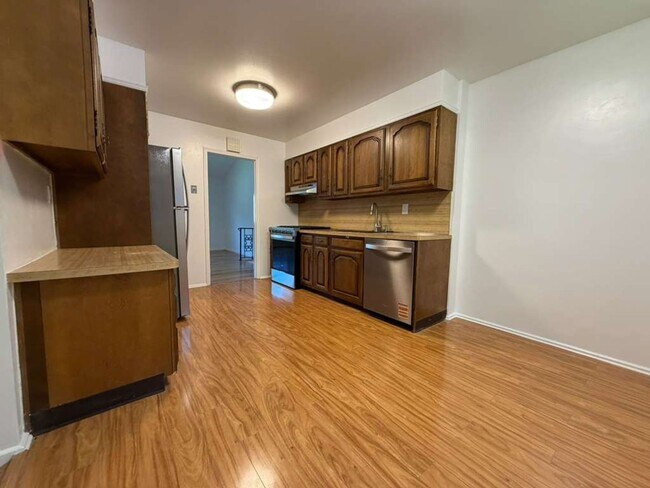 Building Photo - Spacious 4-Bedroom Home with Functional Layout, Backyard Access & Attached Garage