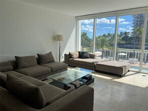 Building Photo - 10275 Collins Ave