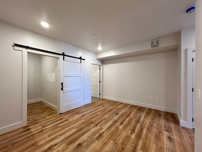 sleeping nook with entrance to closet and bathroom. - 138 E Street