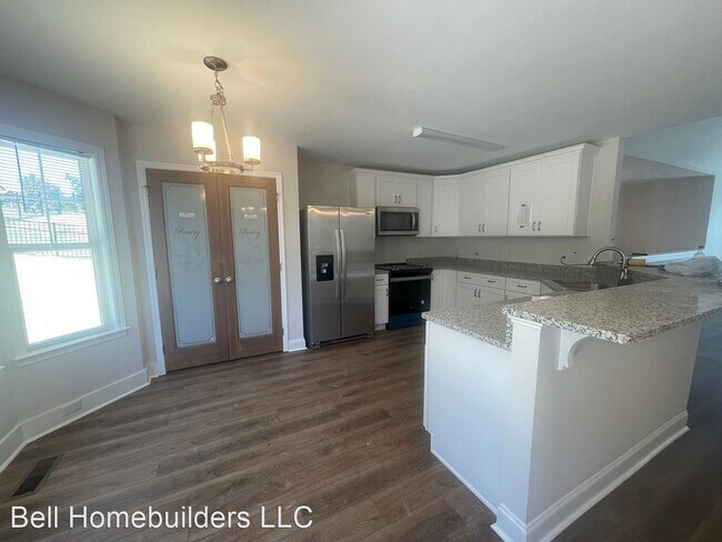Building Photo - 3 br, 2.5 bath House - 7240 Old Bug Lane