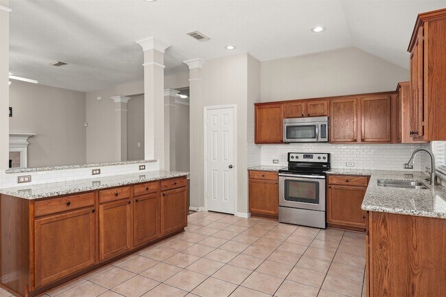 Foto del edificio - 7611 Waterlilly Ln