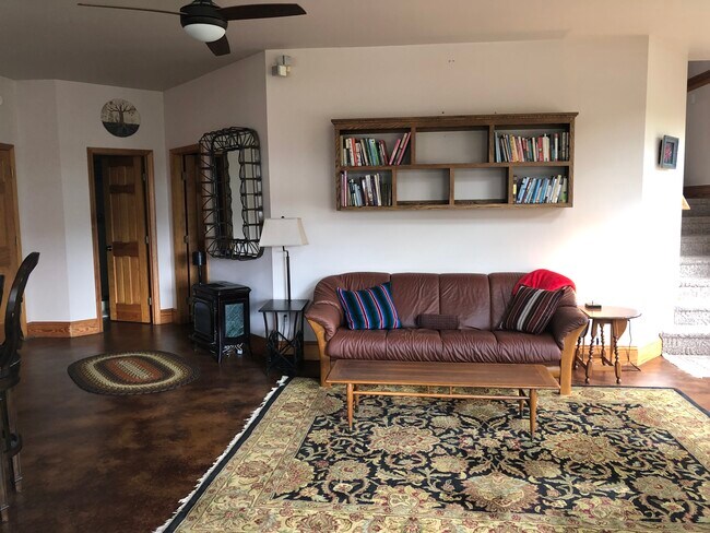 open living area with big windows - 96 Woodrow Ave