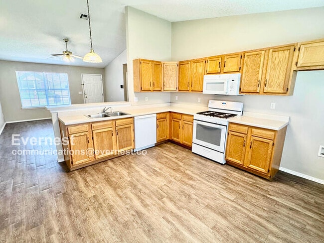 Building Photo - Lovely 3-Bedroom Home with Modern Amenitie...