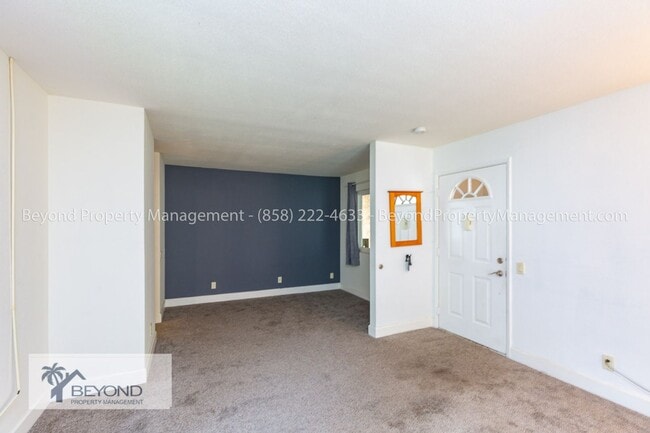 Building Photo - CHARMING JUNIOR 1-BEDROOM END UNIT IN HIGH...
