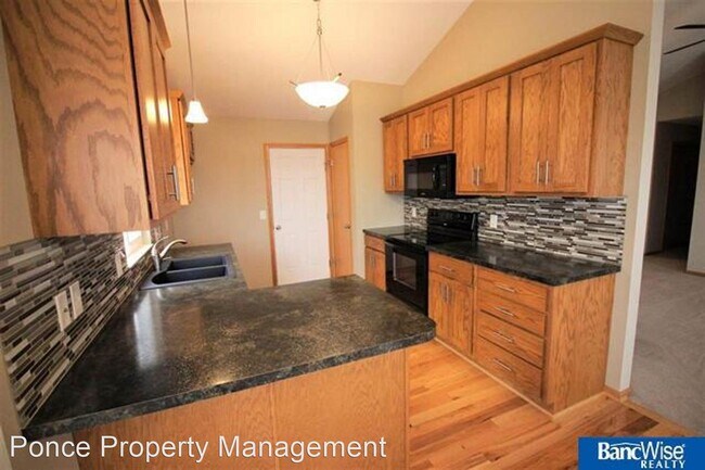 Building Photo - 4 br, 3 bath House - 7241 Helen Witt