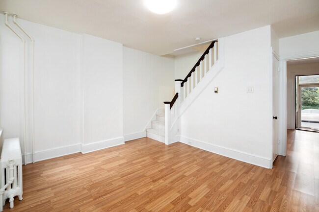 Another view of the middle room with stairs leading up to the bedrooms - 724 Woodlawn Ave