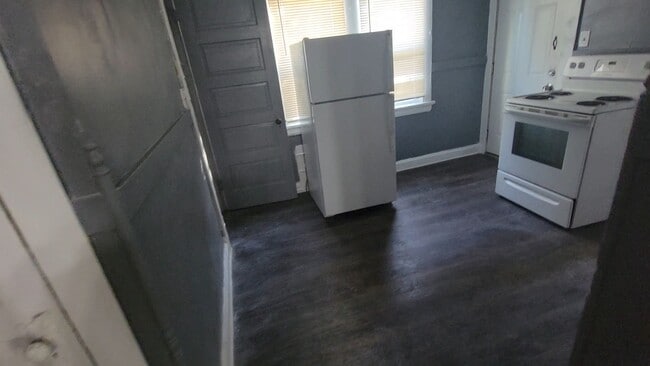 Building Photo - Section 8 Accepted! Charming 4-bedroom hom...