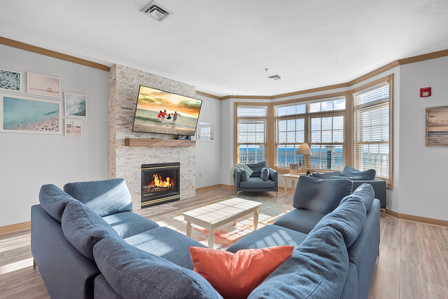 65 in TV & gas fireplace - 819 Beachfront Dr