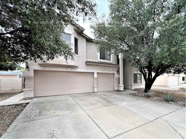 Building Photo - 7447 W Trails Dr
