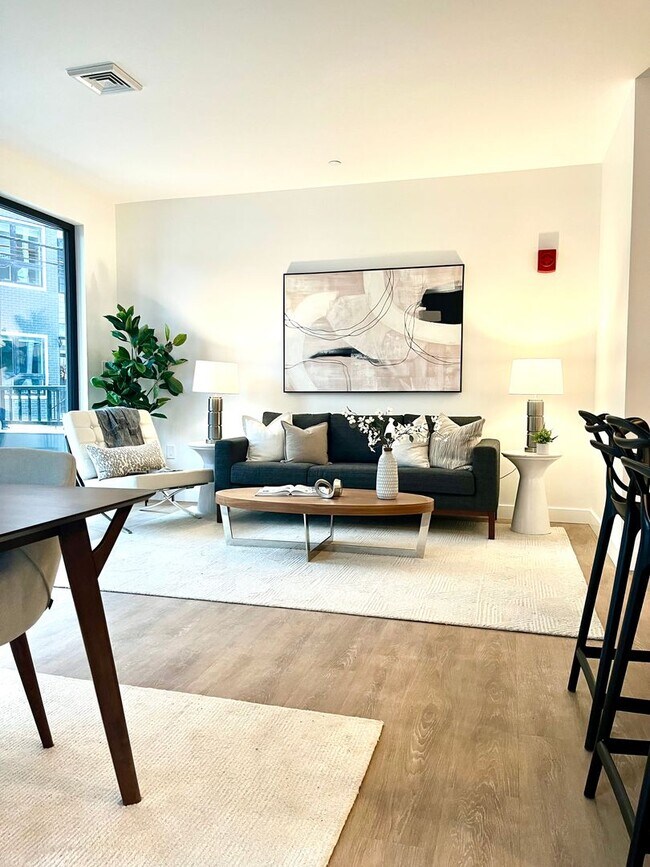 Foto del edificio - New building with garage parking