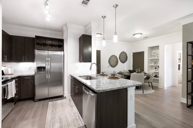 Spacious Kitchen and Dining Area - The Adley Craig Ranch Apartments