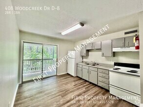 Building Photo - 408 Woodcreek Dr