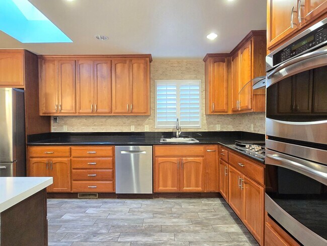 Building Photo - Large Campbell Home, Remodeled Inside, Gorgeous Kitchen, Large Master Suite, Beautiful Yards!