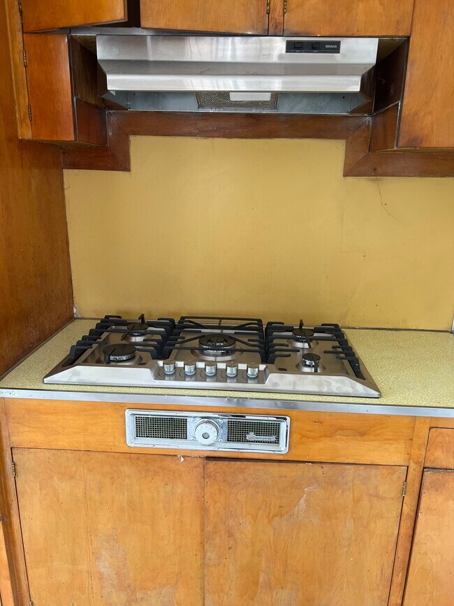 New gas cooktop - 2930 Olive St