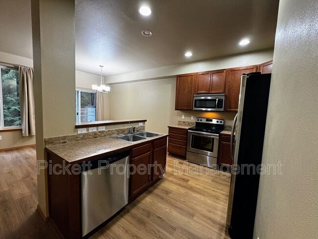 Photo - 136 NE Miramar Cir Townhome