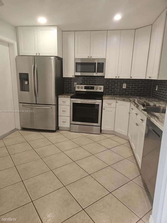 Building Photo - 3 br, 2.5 bath House - 4847 Pinemore Ln # 0