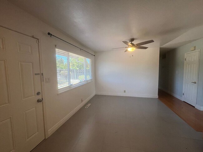 Building Photo - 4 bedroom has nice layout, great location ...