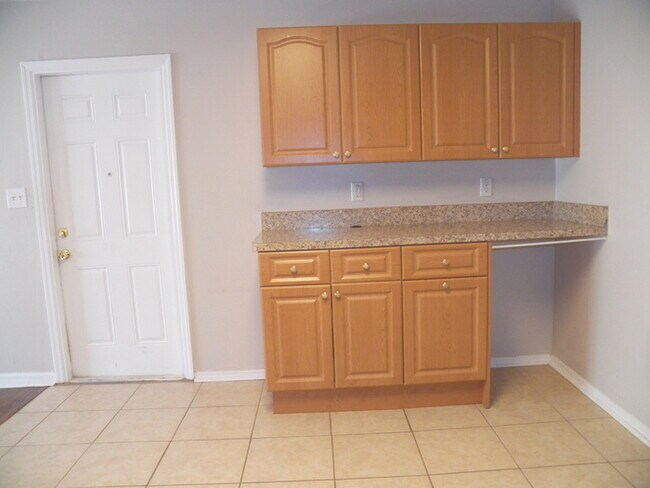 Building Photo - 3/2 Home W/ Wood Flooring!