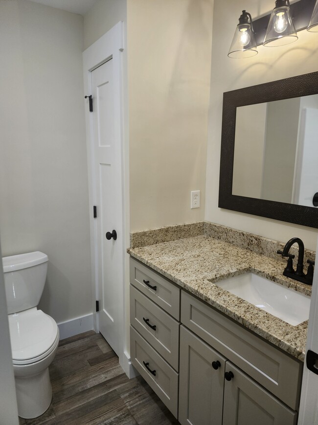 Master bathroom granite counter top linen closet - 347 Beechwood Ln