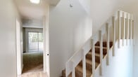 This two-story residence in Valdosta, Georgia offers a functional and well-appointed layout spread across two levels, connected by a carpeted staircase with white-painted railings and wood-style flooring at the base. The kitchen is outfitted with white shaker-style cabinetry, granite-look countertops, and stainless steel appliances, including a full-size refrigerator, complemented by light hardwood-style flooring that adds warmth to the space. The bathrooms feature matching white vanity cabinetry topped with granite-style countertops, large mirrors with overhead vanity lighting, and tile flooring, offering a clean and cohesive aesthetic. Carpeted bedrooms provide a comfortable feel, with at least one room showcasing a large sliding glass door that floods the space with natural light and offers views of surrounding greenery. Closets with built-in hanging rods provide practical storage solutions. Throughout the home, neutral white walls and textured ceilings create a bright, open atmosphere. The overall layout, as seen in the dollhouse view, reflects a well-organized multi-room floor plan designed to maximize usability across both floors.