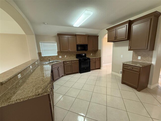 Foto del edificio - 4910 Manor Stone Ln