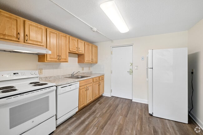 3BR, 2BA - 1,100SF - Kitchen - Rockingham Village Apartments