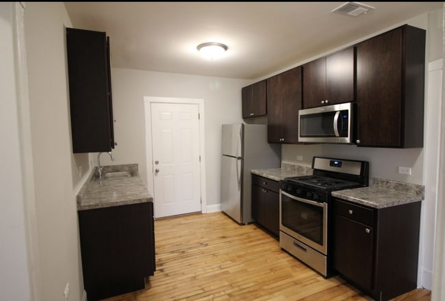 Modern Kitchen with updated appliances - 4402 W Belden St