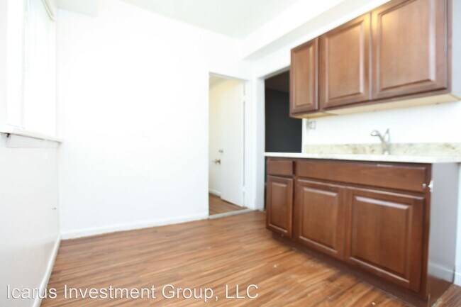 Foto del edificio - 6100-6108 S Eberhart Ave