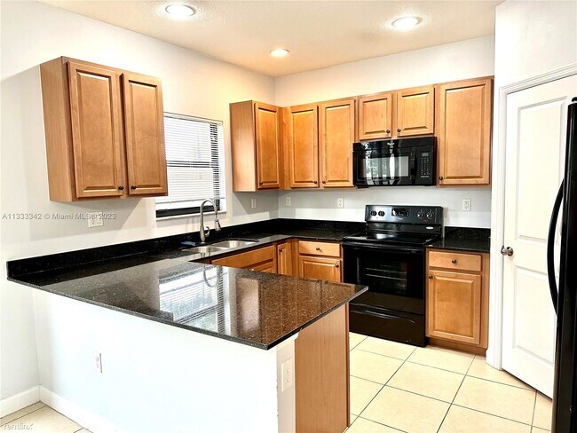 Building Photo - 3 br, 2.5 bath House - 408 NE 194th Ter