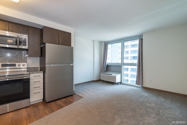 Foto del edificio - Modern 1BR Condo in Prime Ward Village - T...