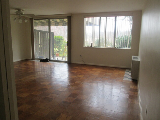 Living room with parquet flooring - 6631 Wakefield Dr