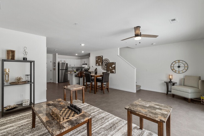 Living Room in 3-Bed Unit - Pine Creek Apartments