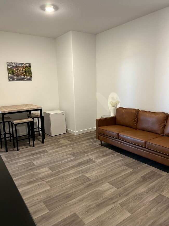 living room w/fridge - 8716 Hamblen Ct