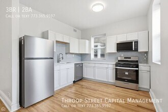 Building Photo - 6134 S Vernon Ave