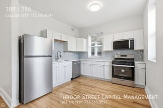 Building Photo - 6134 S Vernon Ave