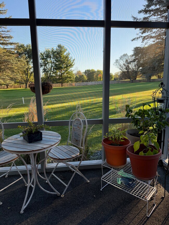 The porch overlooking the Willow Creek golf course - 4888 Tee Ct SW
